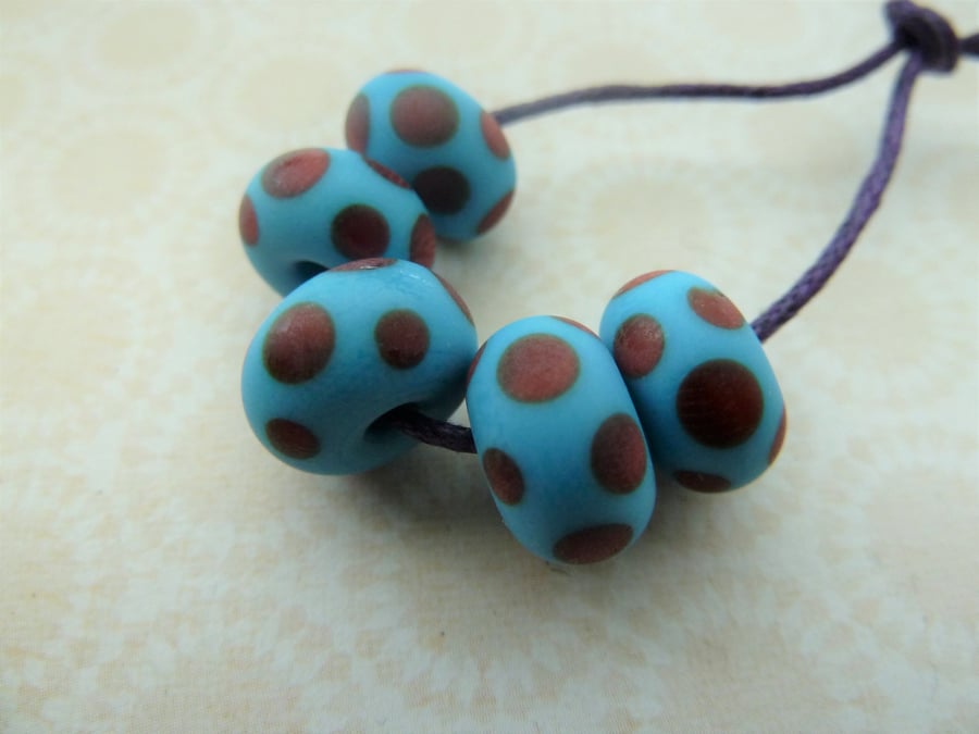 blue and red spots handmade lampwork glass beads