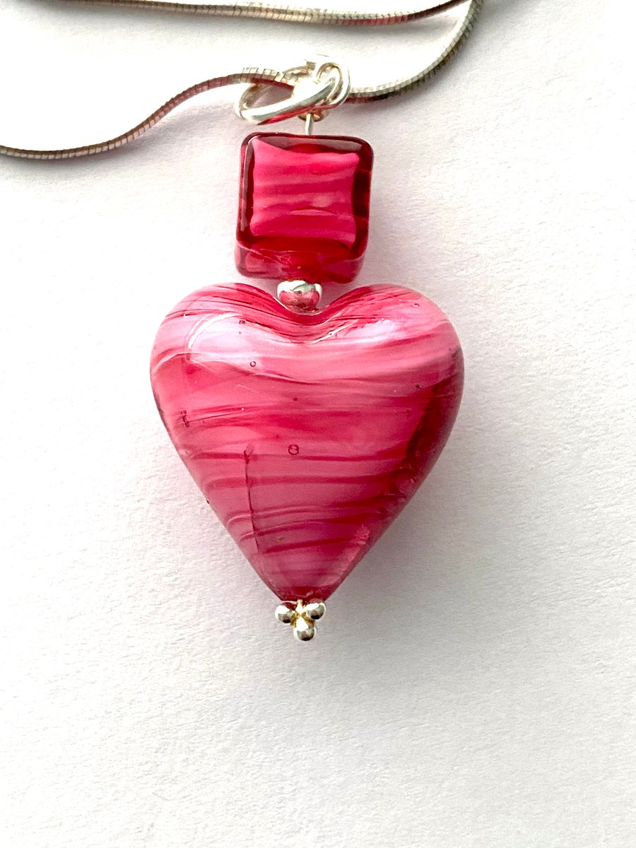 Murano glass pink heart pendant with sterling silver.