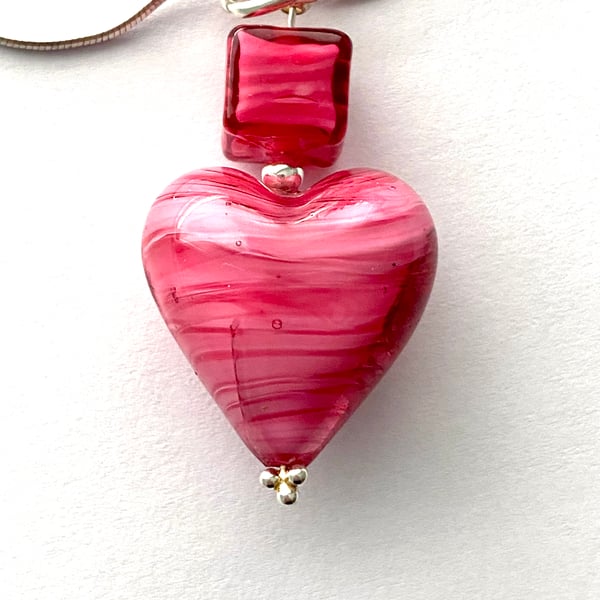 Murano glass pink heart pendant with sterling silver.