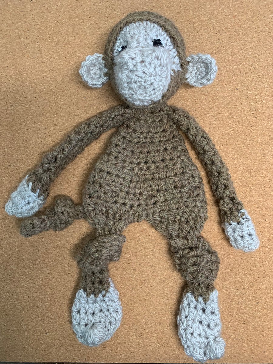 Monkey, pets snuggle buddy. Crochet.