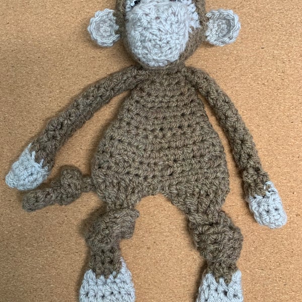 Monkey, pets snuggle buddy. Crochet.