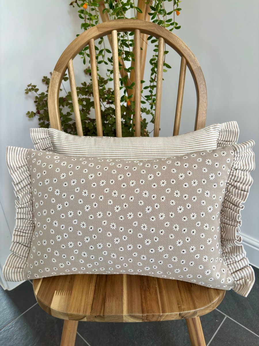 Frilled edge cushion cover with floral daisy print and stripes in beige