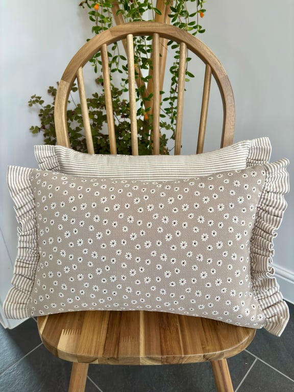 Frilled edge cushion cover with floral daisy print and stripes in beige