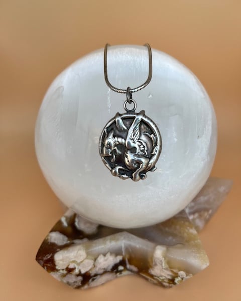 Silver dragon pendant. 