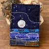 Embroidered up-cycled full moon seascape brooch pin or badge. 
