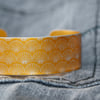 Geometric shell pattern cuff bracelet orange