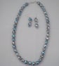 Blue and Silver Sparkly Necklace and Earrings Set - Image 1