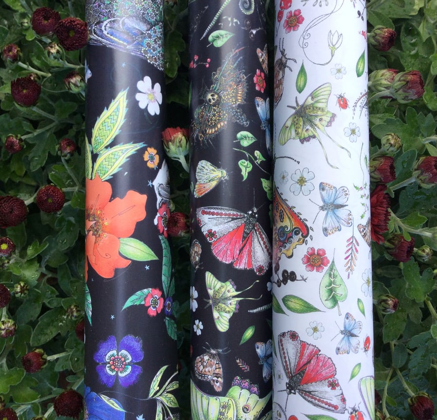 3 sheets of different Gift wrap