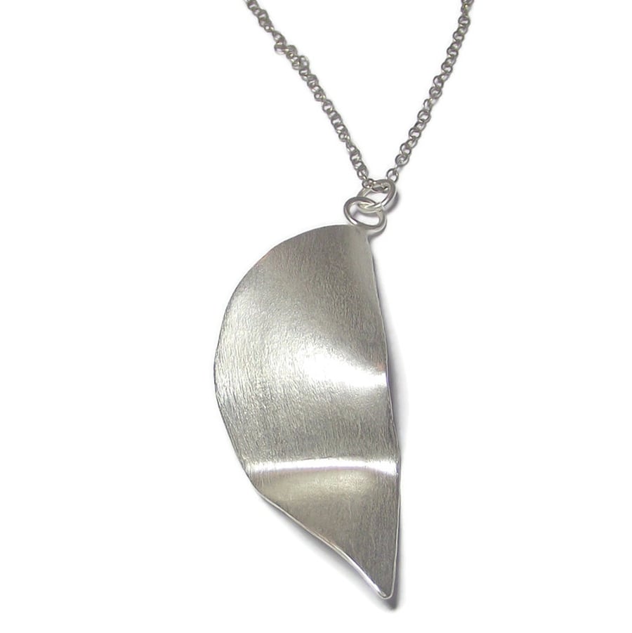 Sculptural semi circle fold formed sterling silver pendant