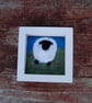 Sheep amongst flowers - needlefelt with embroidery