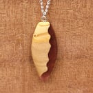 Olive wood and pale red resin pendant - free UK postage