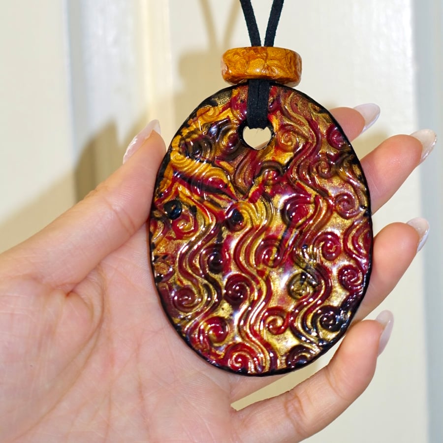 Red Swirl Necklace with Multicoloured Pendant 