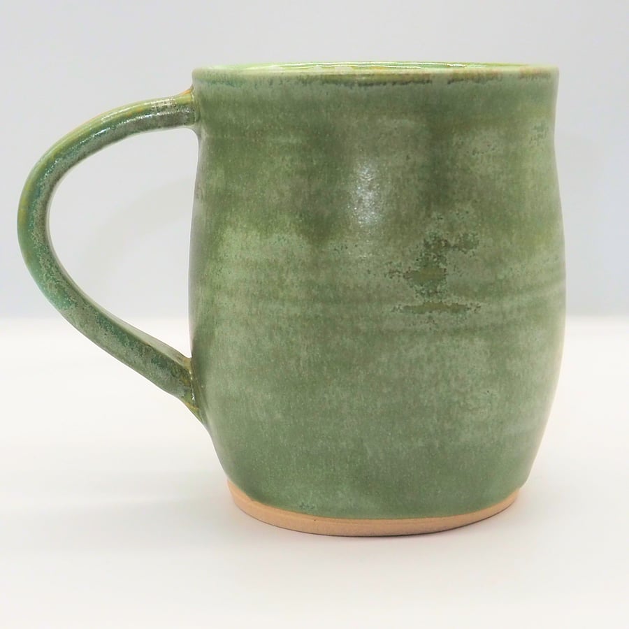 Large stoneware pottery mug finished in a sage green satin glaze