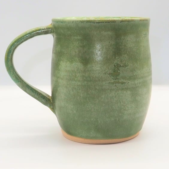 Large stoneware pottery mug finished in a sage green satin glaze