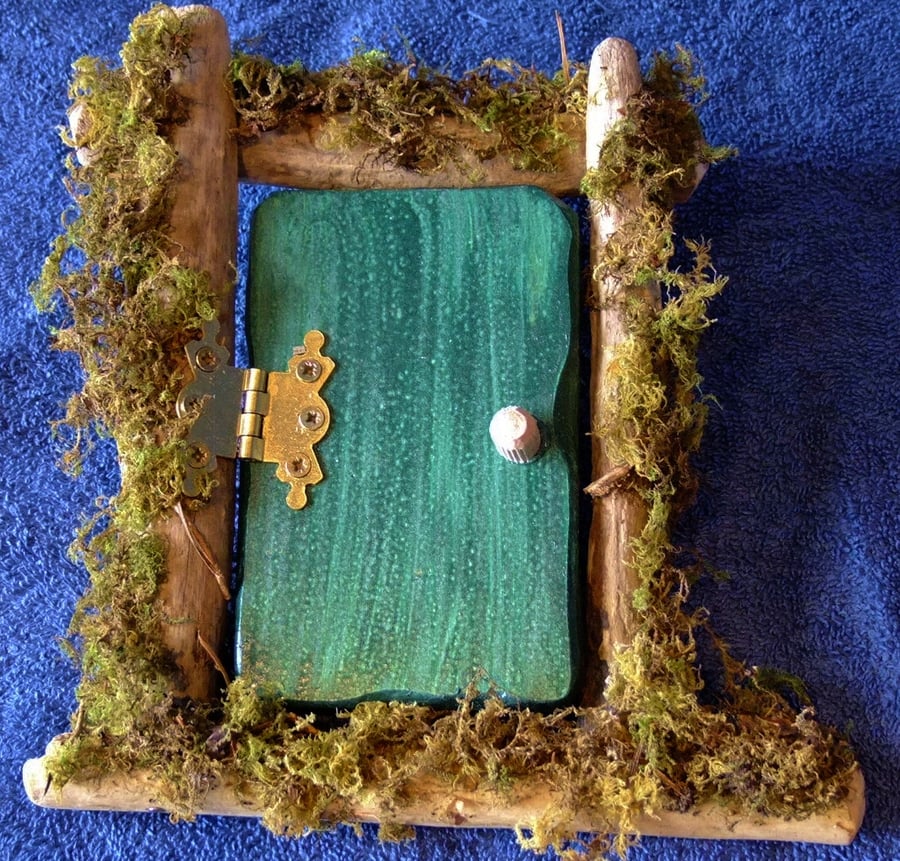 Handcrafted magical fairy or hobbit door for home or garden decoration ornament