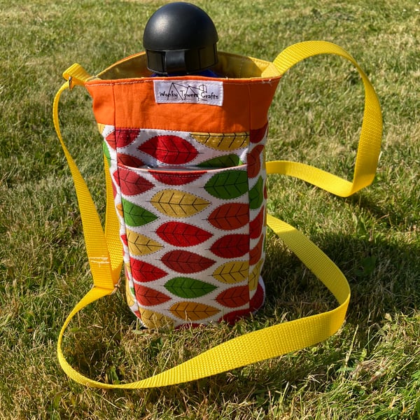 Water bottle carrier with pocket for phone - leaf design.