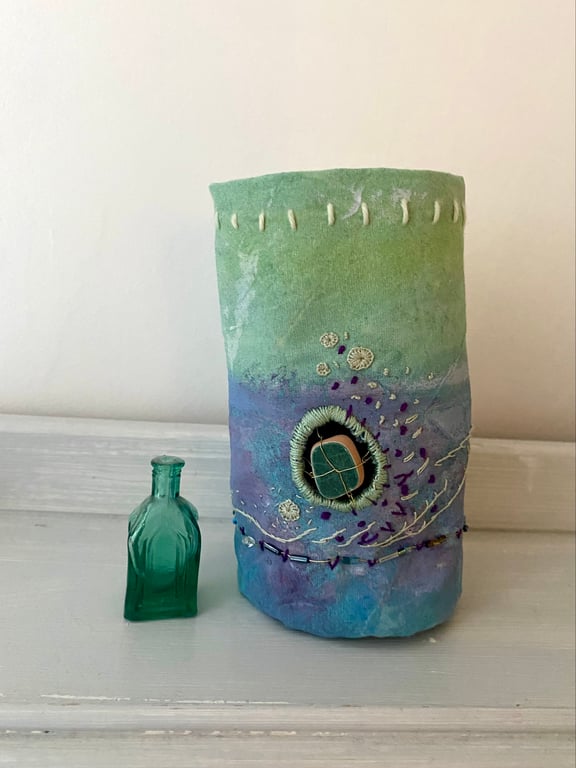Hand painted and embroidered textile vessel, with a gift from the sea 
