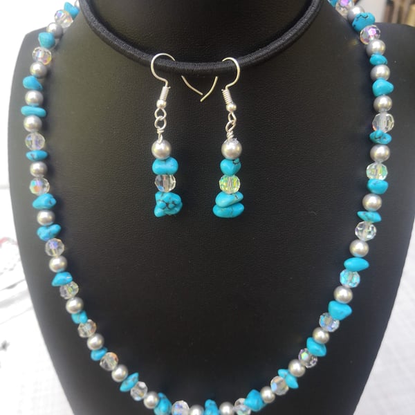 Sparkly turquoise and clear crystal necklace and earring set