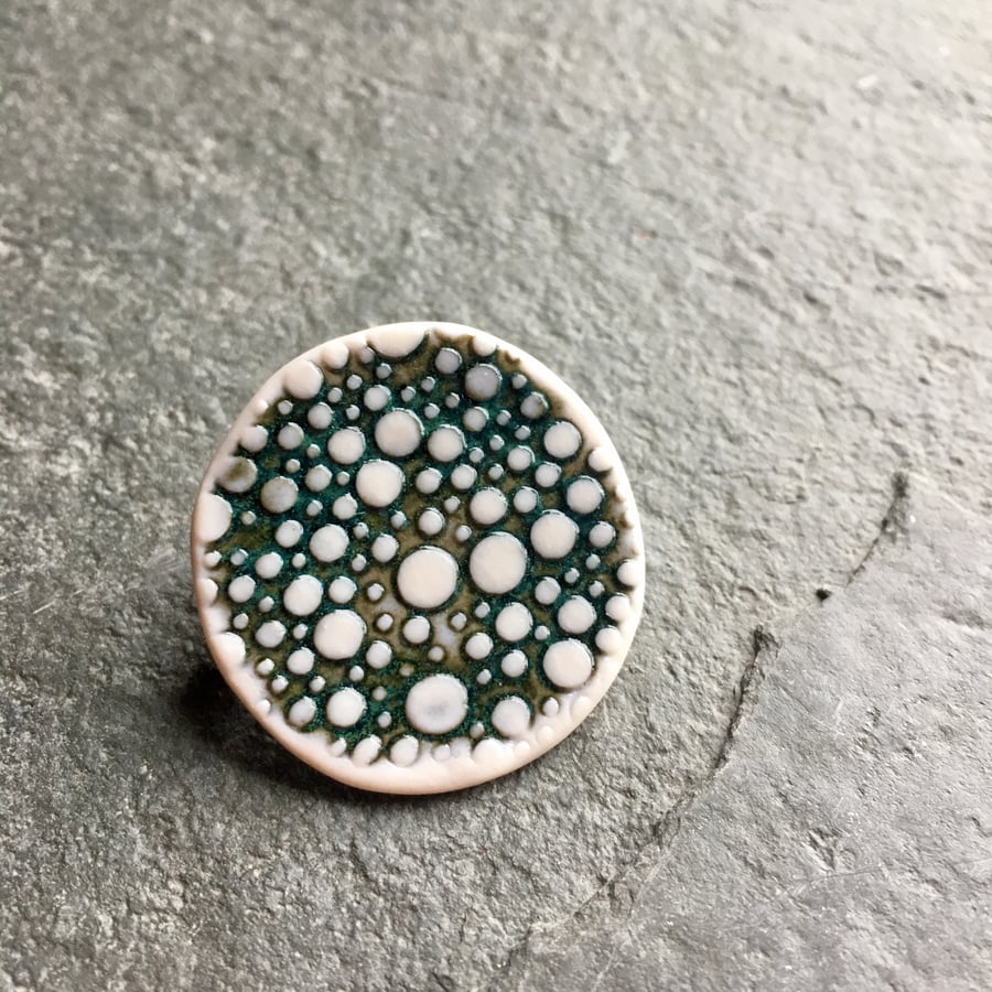 Porcelain brooch spotted blue green white The Porcelain Menagerie