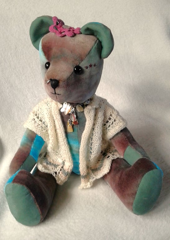 Ocean, a unique collectable velvet bear with a hand knitted lace jacket.