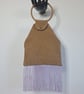 Brown Suede effect hoop handle bag with lilac satin lining. 