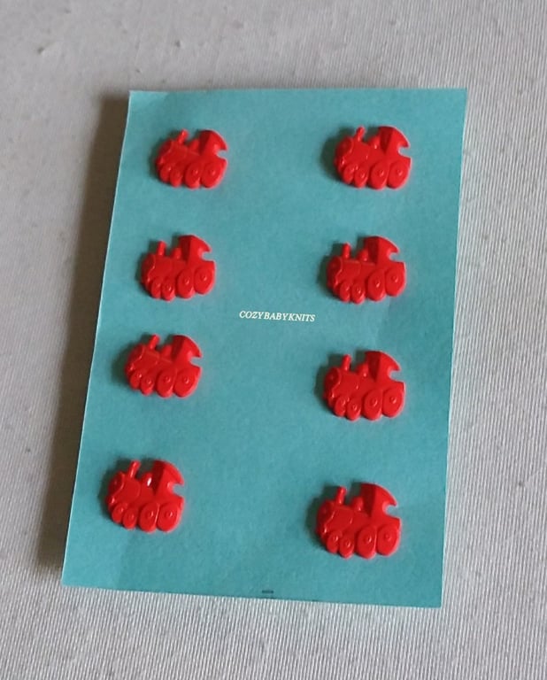 Plastic red train buttons