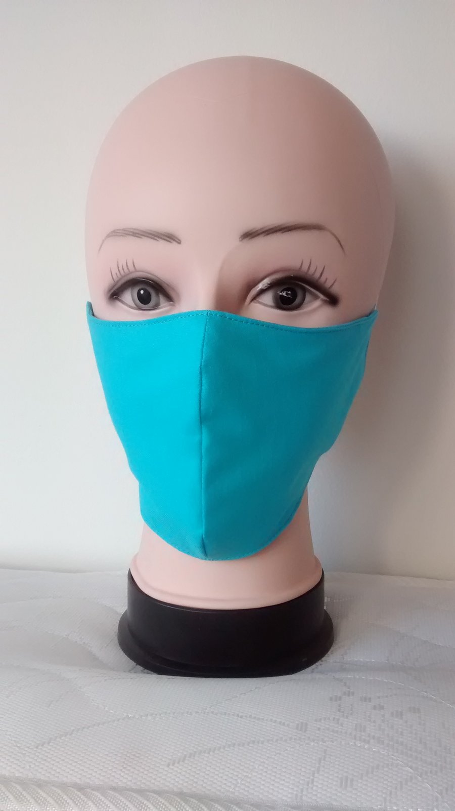 Handmade 3 layers turquoise reusable adult face mask.