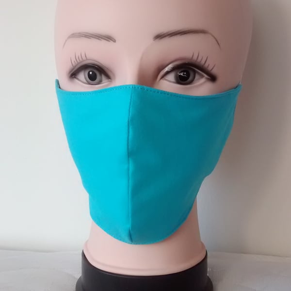 Handmade 3 layers turquoise reusable adult face mask.