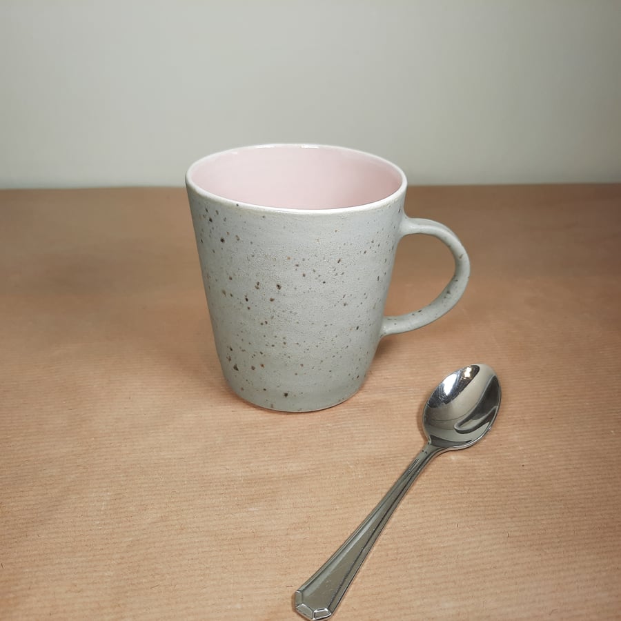 Tall pink and grey ceramic mug
