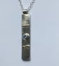 Sapphire grounding pendant 