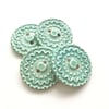 Set of four blue ceramic handmade buttons