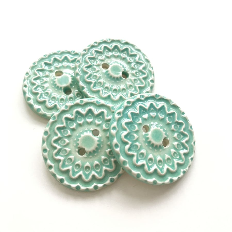 Set of four blue ceramic handmade buttons