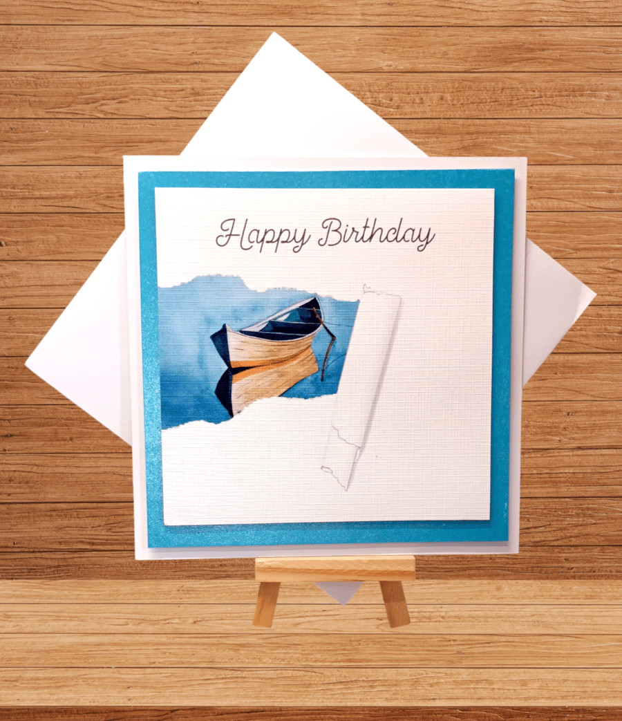 Unusual torn paper effect boat birthday card