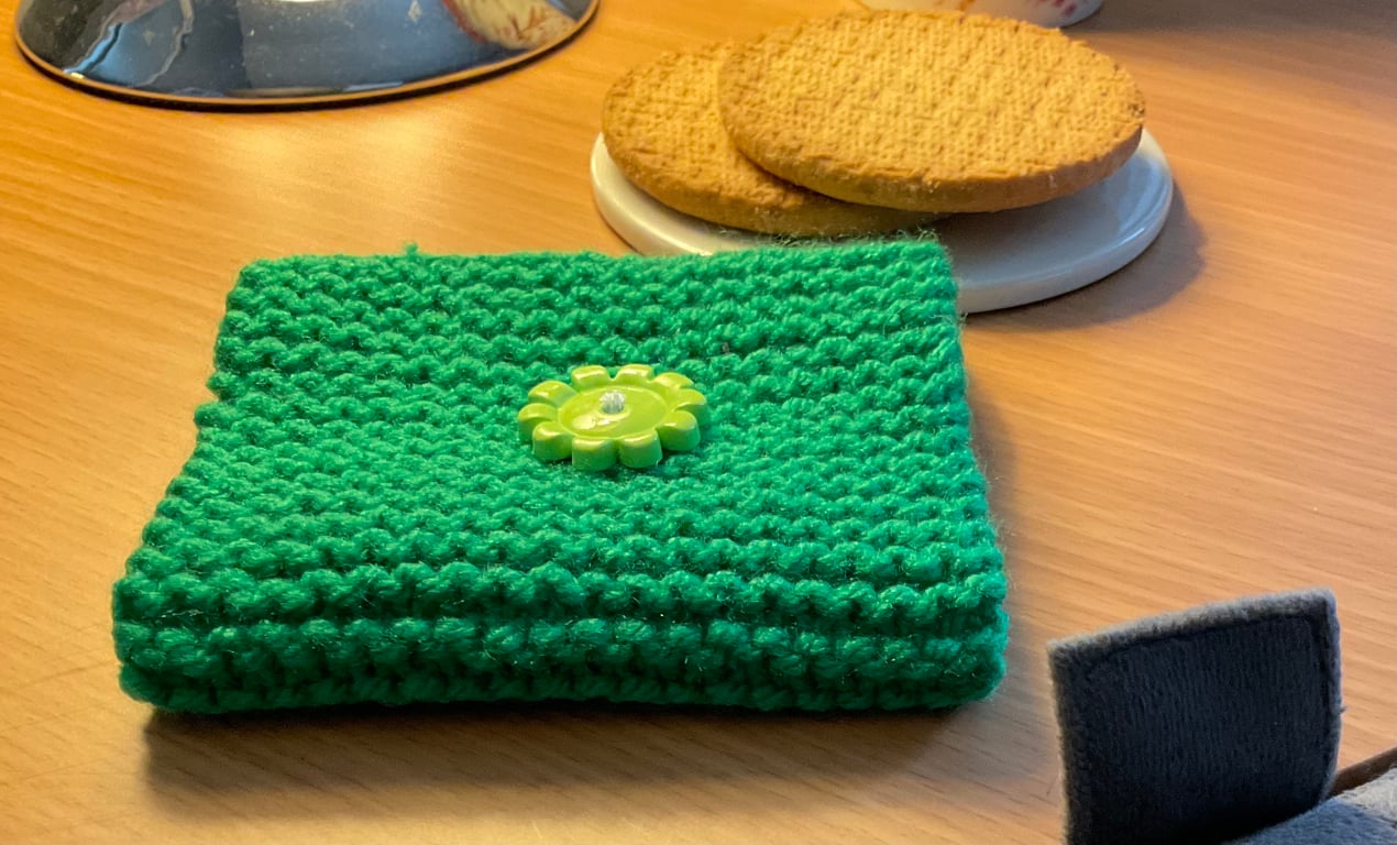 Coffee Cup Cosy Green knitted with Cute decorative Flower Button