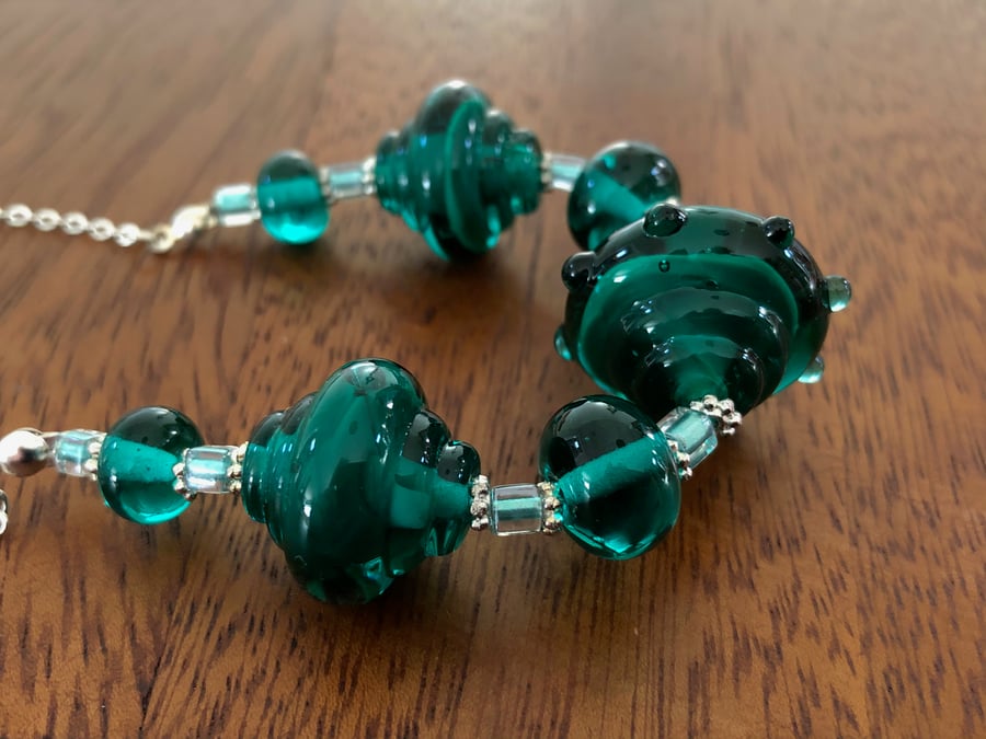 lampwork glass beaded necklace dark teal emerald green fancy shaped beads