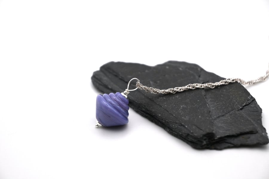 purple lampwork glass spinning top pendant necklace
