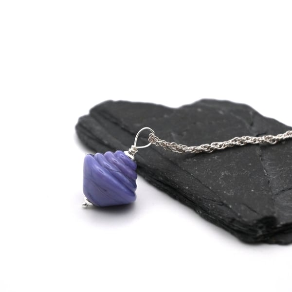 purple lampwork glass spinning top pendant necklace