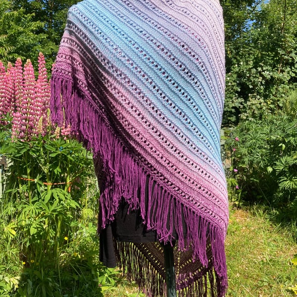 Hand knitted triangular fringed shawl in ombre purple and pinks 