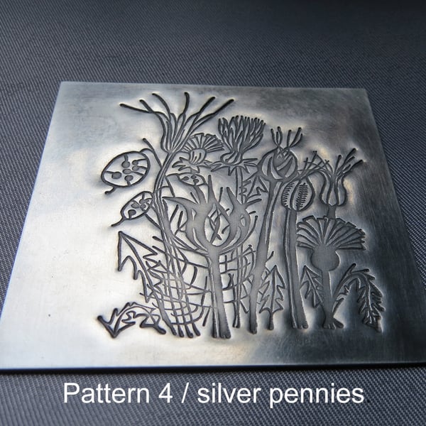 Pewter embossed coaster with antiqued satin finish & cork base.