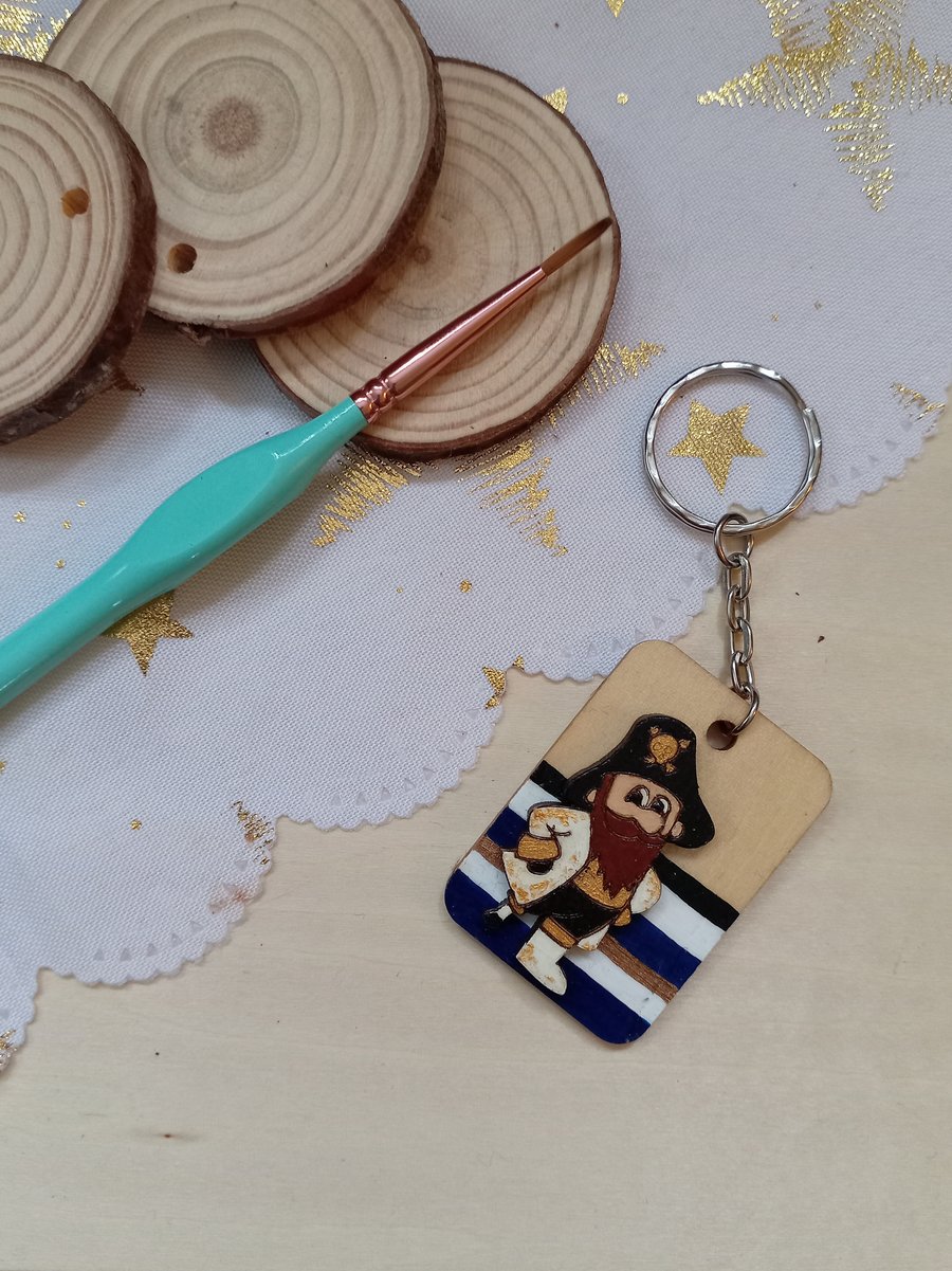 Wooden rectangular white jacket pirate keyring 