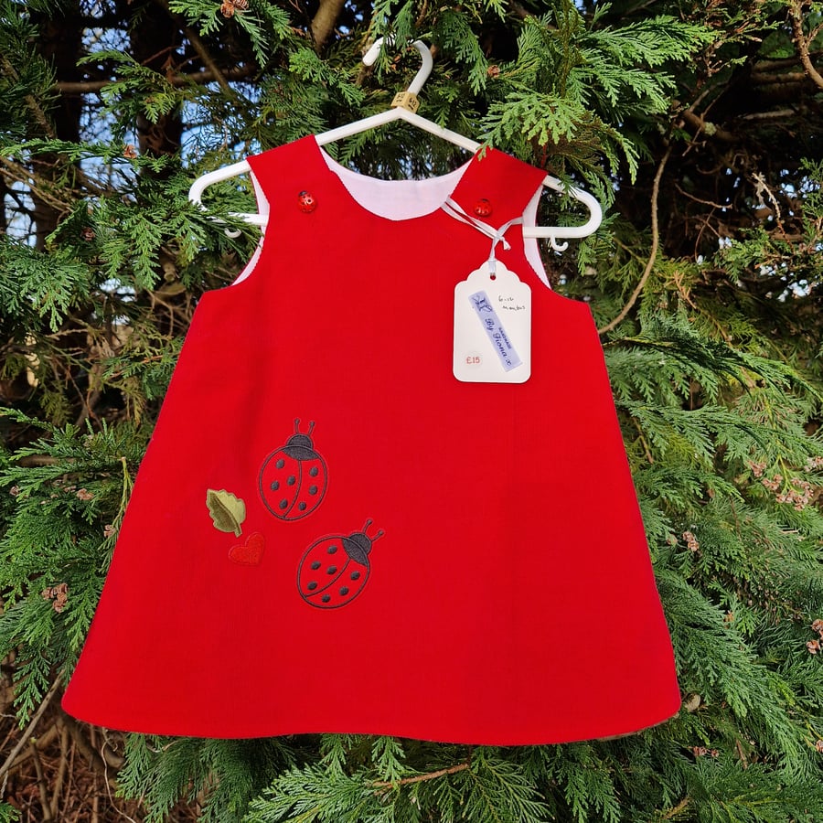 Age: 6-12m. Red Ladybird Needlecord dress. 
