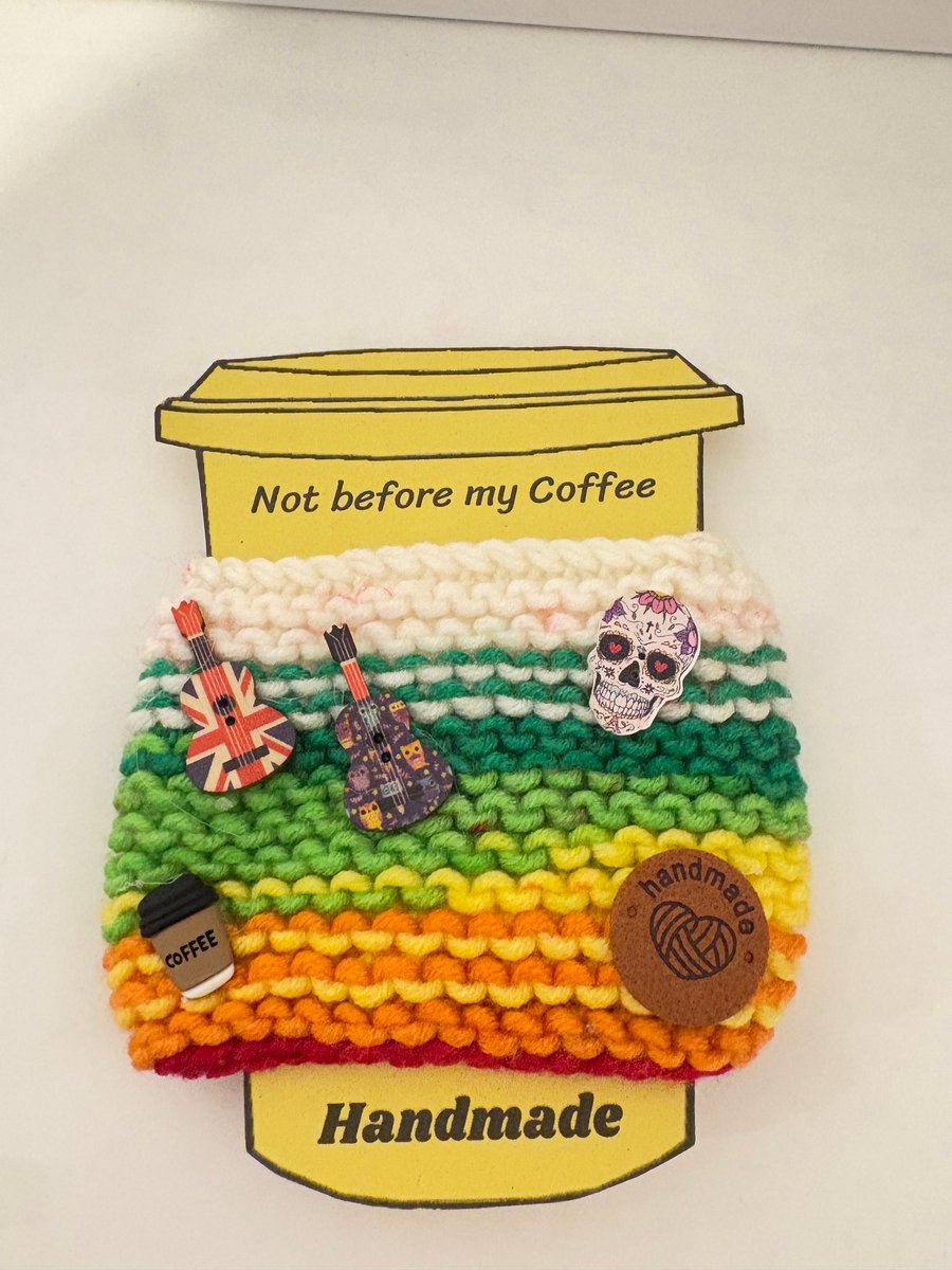 Guitar and skull knitted cup cosy. 