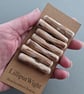Set of seven driftwood toggle buttons with single hole - Image 1