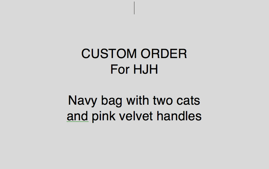 Navy project bag with two appliquéd cats and pink velvet handles