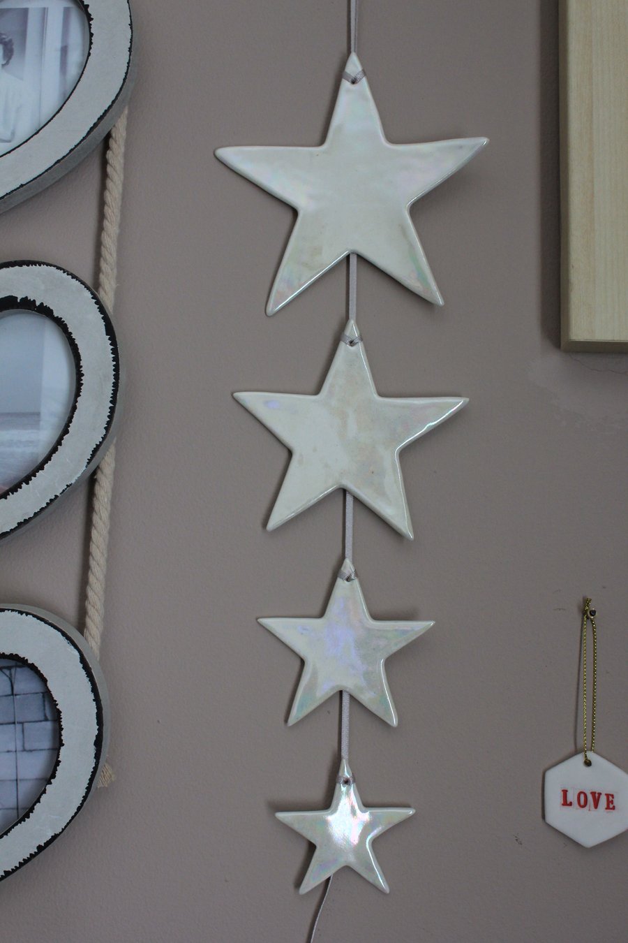 Handmade ceramic white stars with mother of pearl lustre hanging decoration