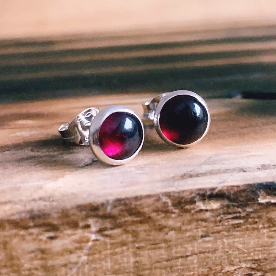 Garnet stud earrings on sale sterling silver