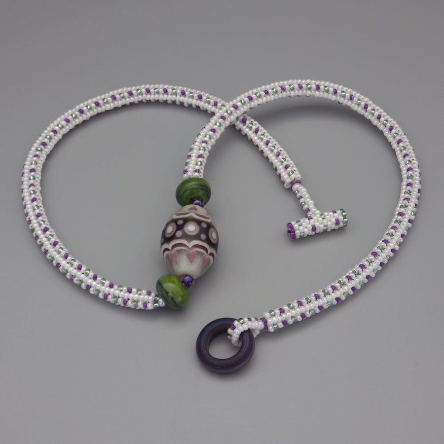 White, purple and green beadwoven necklace with UK lampwork beads