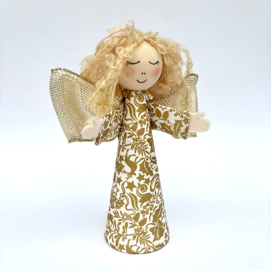 Christmas tree topper angel. Gold tree decoration. Fairy for Christmas tree