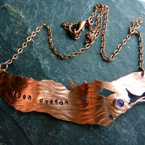 Copper or brass Lie of the Land brooch or pendant