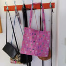 Tote bag handmade in a jellyfish theme on a pink background ideal for gifting